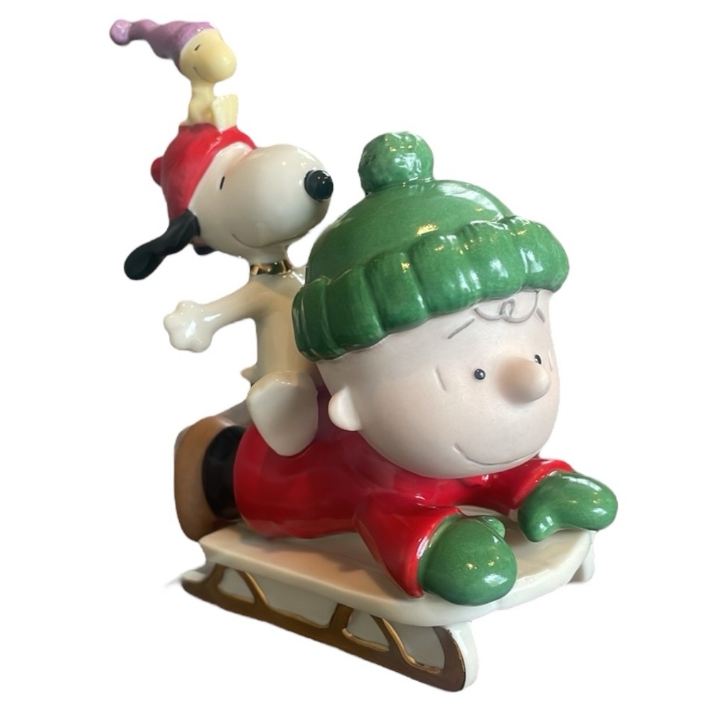 Peanuts Holiday Sledding Figurine with Snoopy Charlie Brown and Woodstock